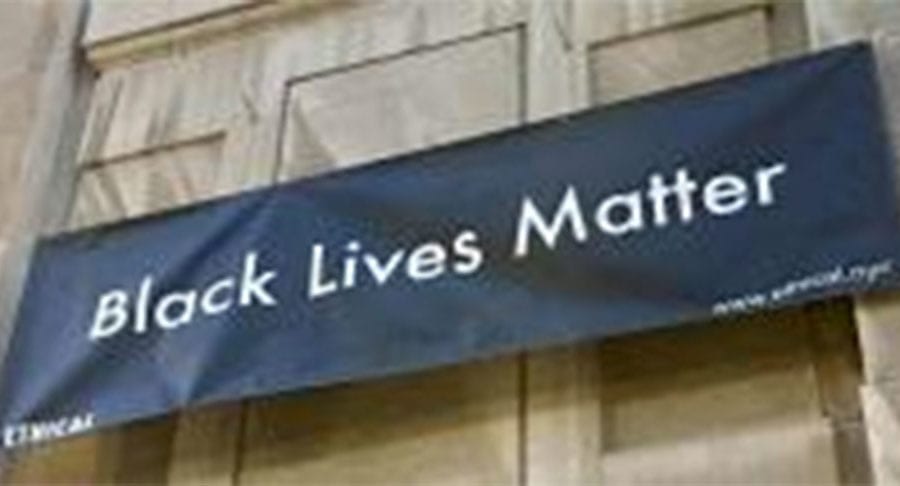 Black lives banner banner hung outside the Society for Ethical Culture