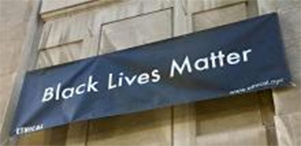 Black lives banner banner hung outside the Society for Ethical Culture